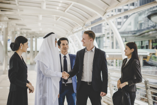Off-plan apartment building under construction in Dubai", "Buyer comparing off-plan property payment plans on Xploon", "UAE developer presenting off-plan project floor plans