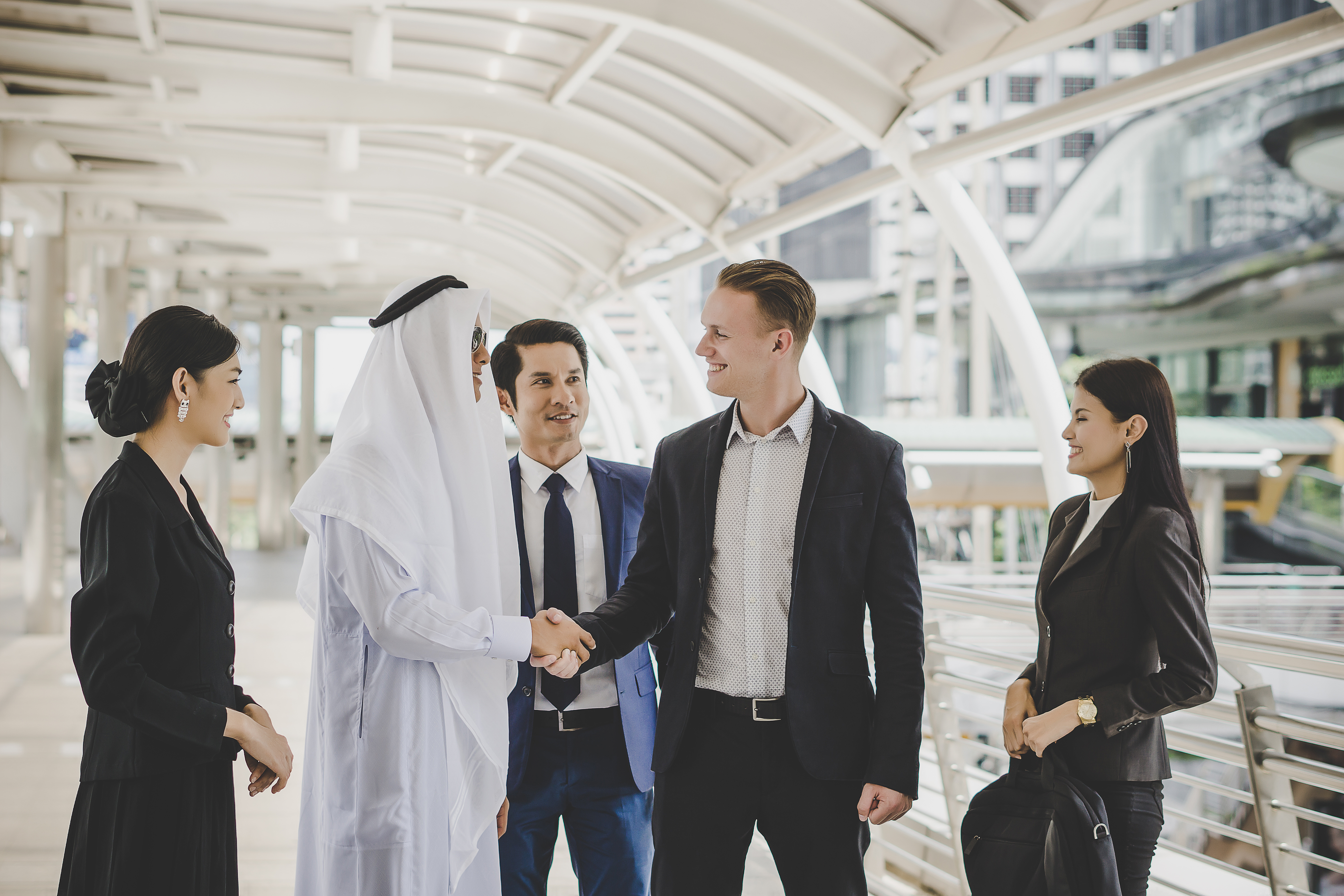 Off-plan apartment building under construction in Dubai", "Buyer comparing off-plan property payment plans on Xploon", "UAE developer presenting off-plan project floor plans